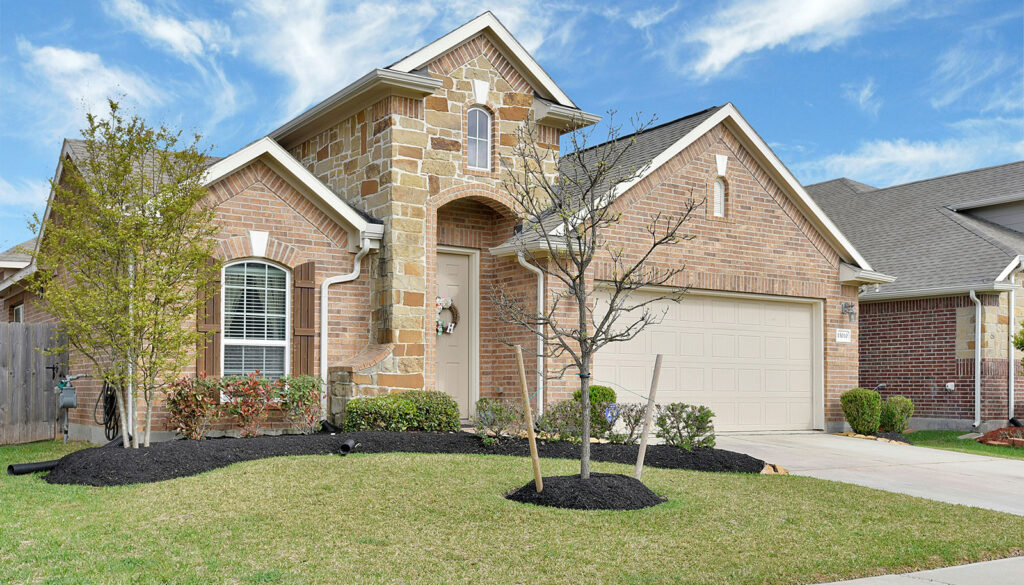 Freshly powerwashed brick house