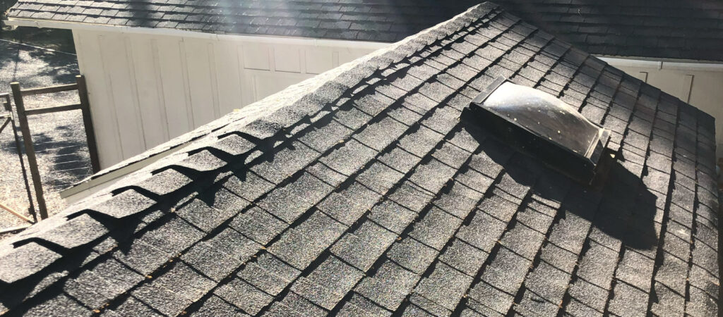 A roof that was cleaned of roof moss during winter