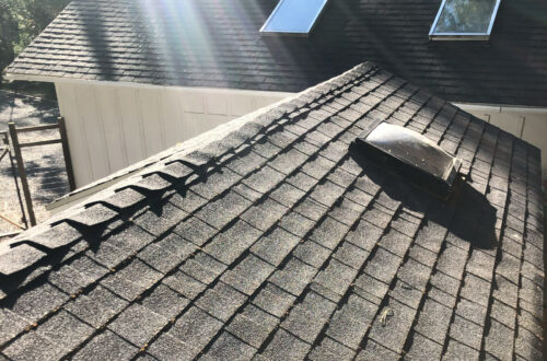 A roof that was cleaned of roof moss during winter