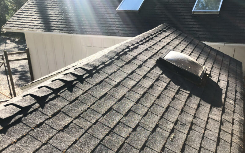 A roof that was cleaned of roof moss during winter