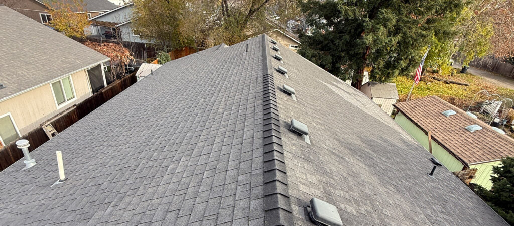 A roof in Medford Oregon that was treated with roof moss prevention treatment