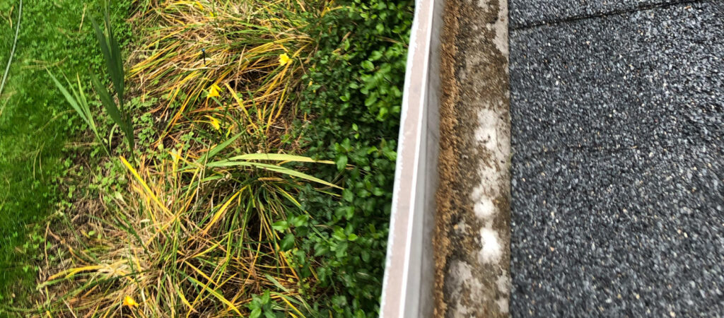 A semi-clean rain gutter not clean enough due to improper DIY