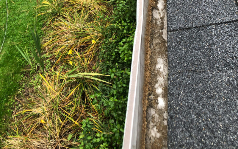 A semi-clean rain gutter not clean enough due to improper DIY
