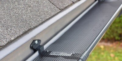 A gutter with gutter guards installed