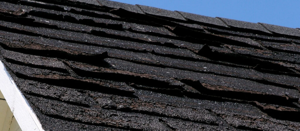 A deteriorating roof that has been ignored and is in need of maintenance