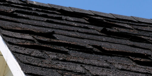 A deteriorating roof that has been ignored and is in need of maintenance
