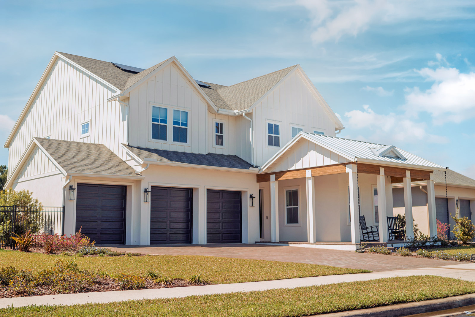 A clean, white farmhouse-style home in Southern Oregon that recent got washed
