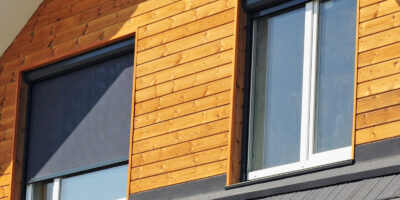 Close up of two clean windows with screens and frames