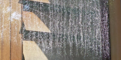 Hard water spots on a window in Southern Oregon